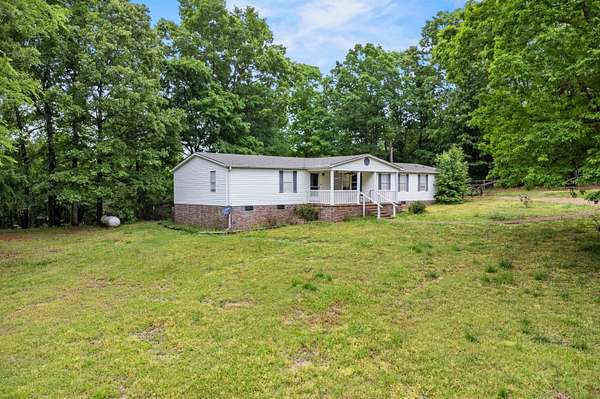 9.46 Acres of Land with Home for Sale in Somerville, Tennessee