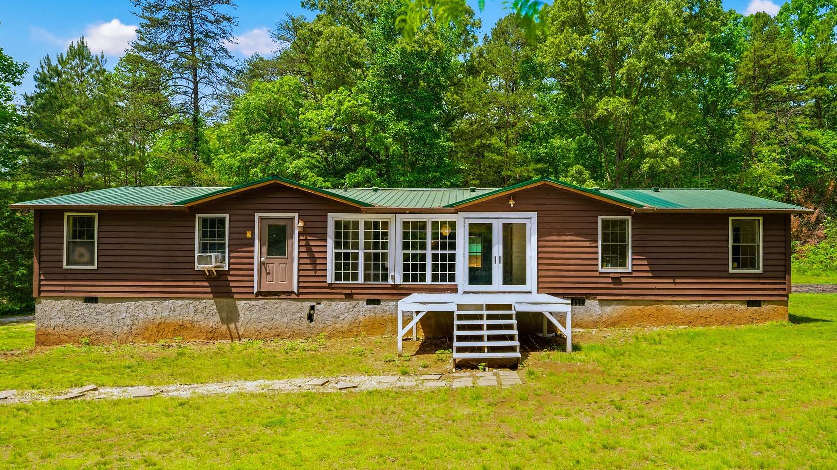 10.8 Acres of Land with Home for Sale in Madisonville, Tennessee