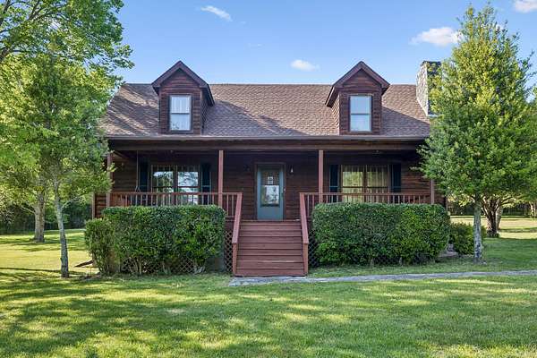 38.4 Acres of Land with Home for Auction in Bradyville, Tennessee