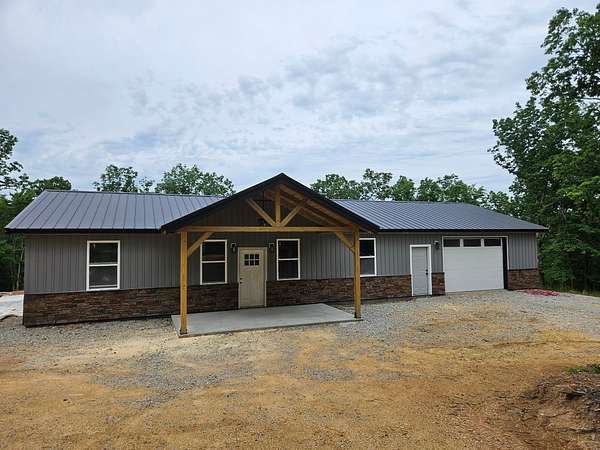 3 Acres of Land with Home for Sale in Linden, Tennessee