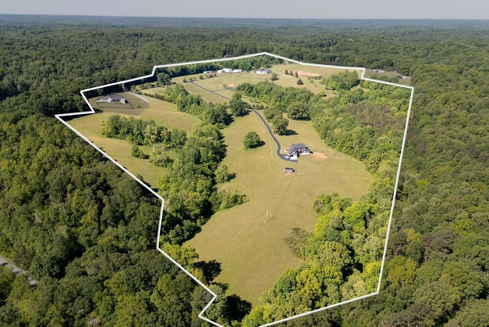 91.2 Acres of Land with Home for Sale in Vanleer, Tennessee