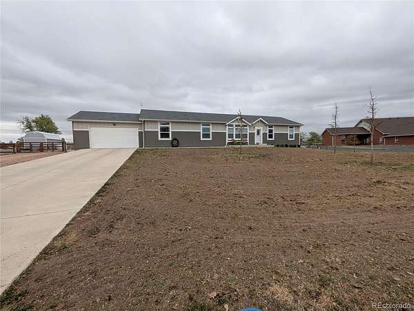 1.89 Acres of Land with Home for Sale in Fort Lupton, Colorado