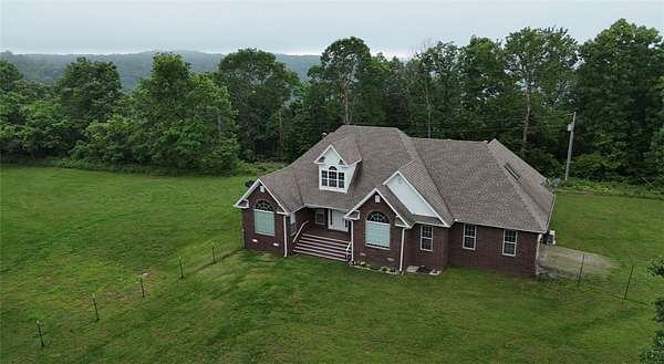 3.42 Acres of Land with Home for Sale in Ozone, Arkansas