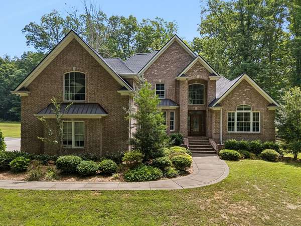 9.87 Acres of Land with Home for Sale in Springfield, Tennessee