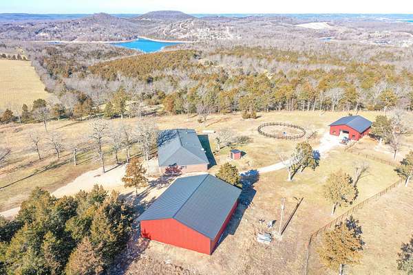 177 Acres of Land with Home for Sale in Lampe, Missouri