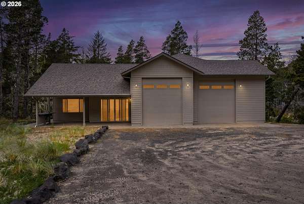 5.19 Acres of Land with Home for Sale in North Bend, Oregon