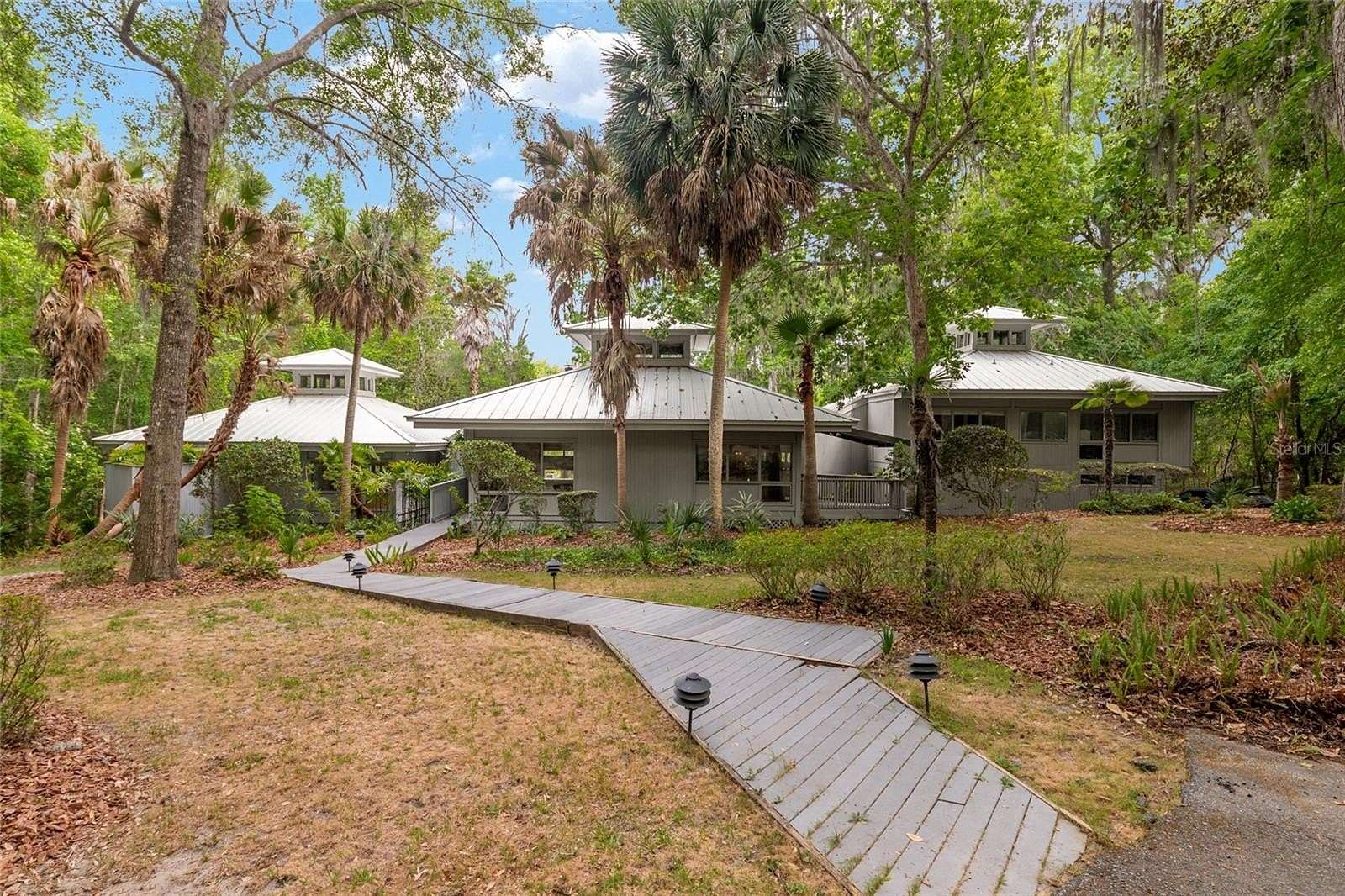 2.39 Acres of Land with Home for Sale in Gainesville, Florida