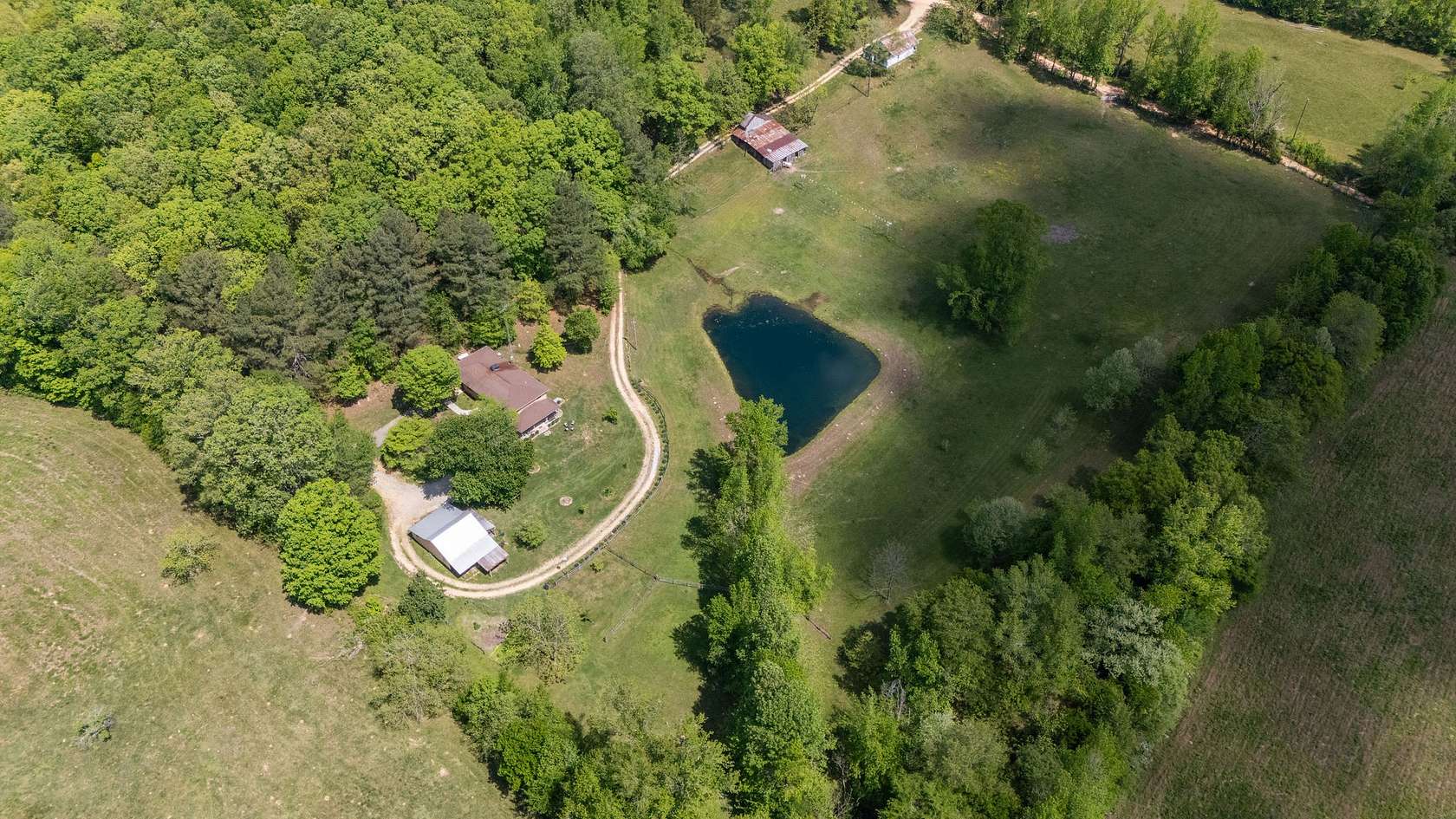 25 Acres of Agricultural Land with Home for Sale in Cypress Inn, Tennessee
