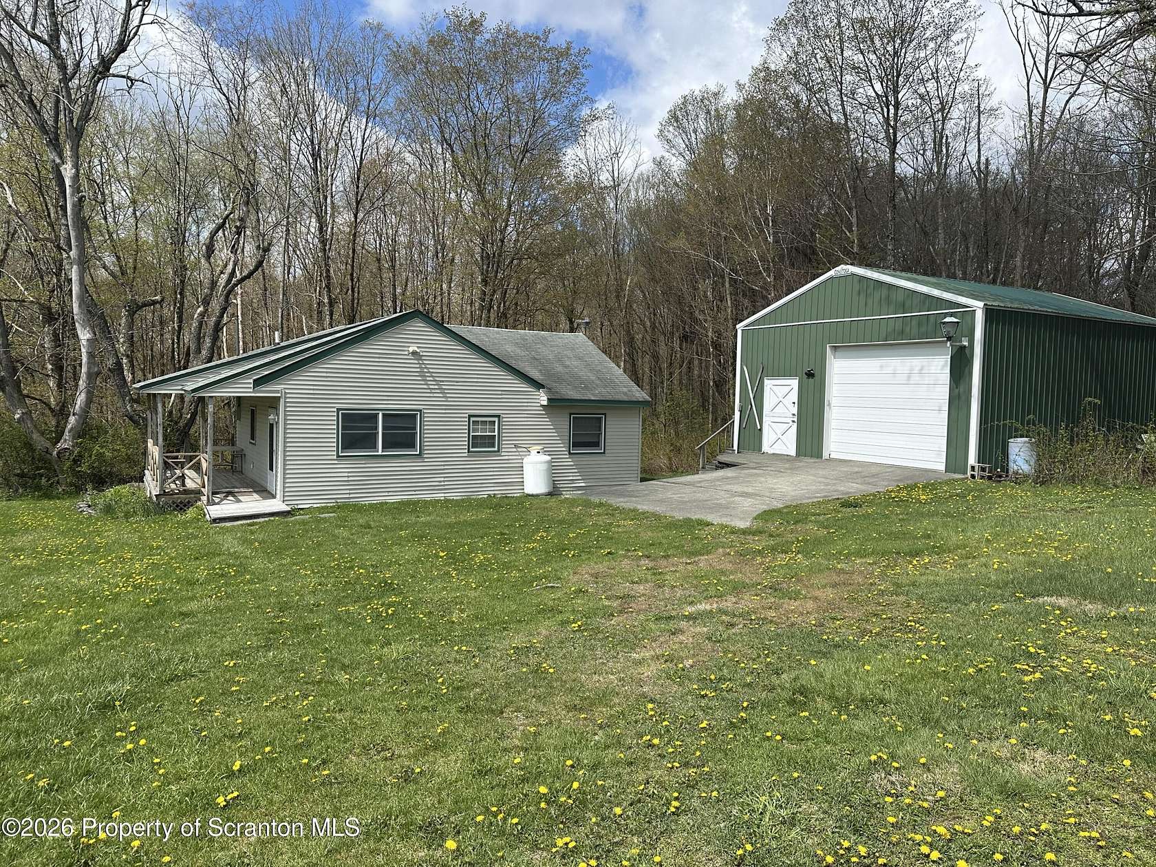 6.27 Acres of Land with Home for Sale in Thompson, Pennsylvania
