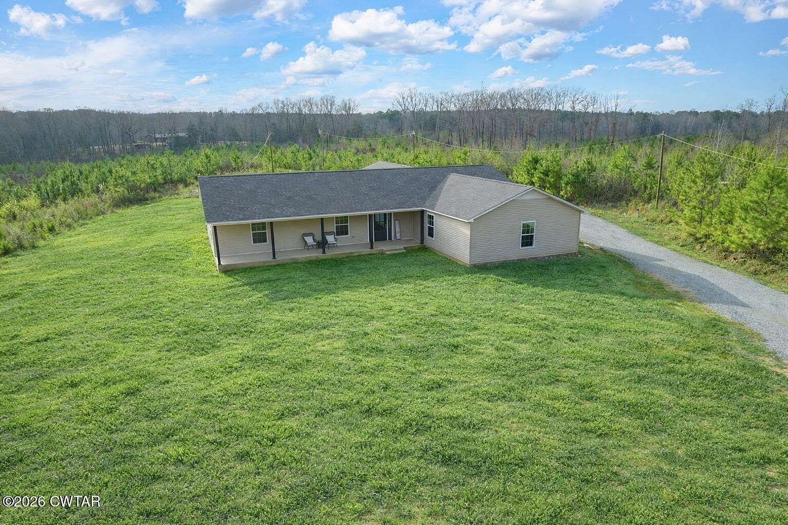 6.8 Acres of Land with Home for Sale in Selmer, Tennessee