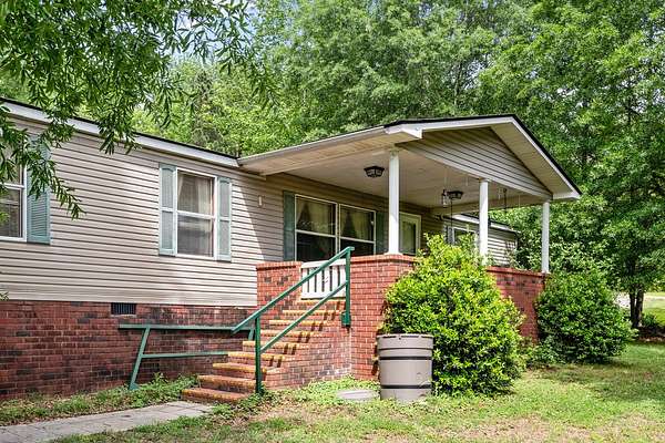 3 Acres of Land with Home for Sale in Camden, Tennessee