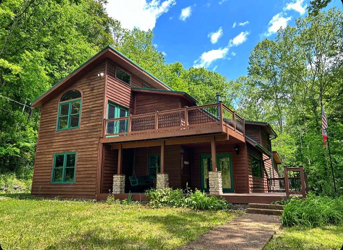 7.26 Acres of Land with Home for Sale in Pleasant Shade, Tennessee