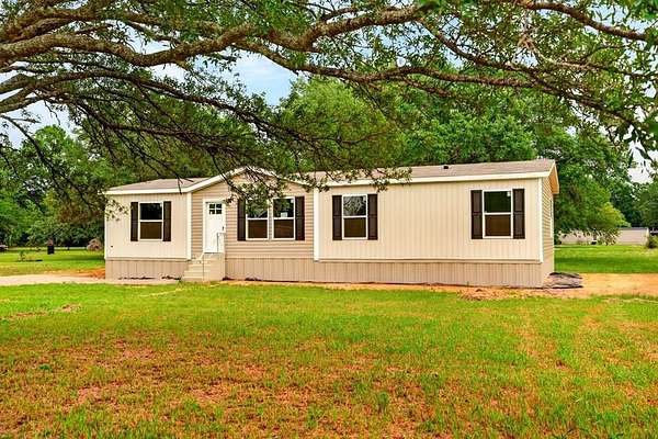 1.5 Acres of Land with Home for Sale in Carriere, Mississippi