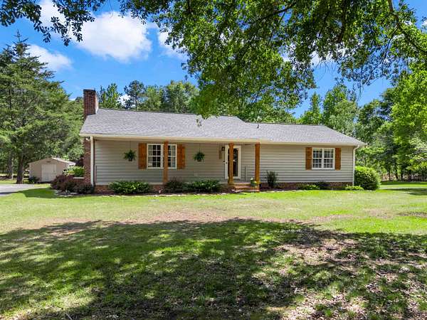 5.73 Acres of Land with Home for Sale in Roebuck, South Carolina