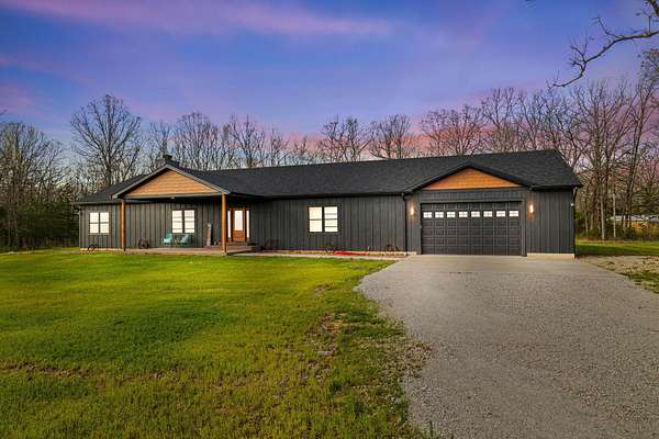10.9 Acres of Land with Home for Sale in Urbana, Missouri