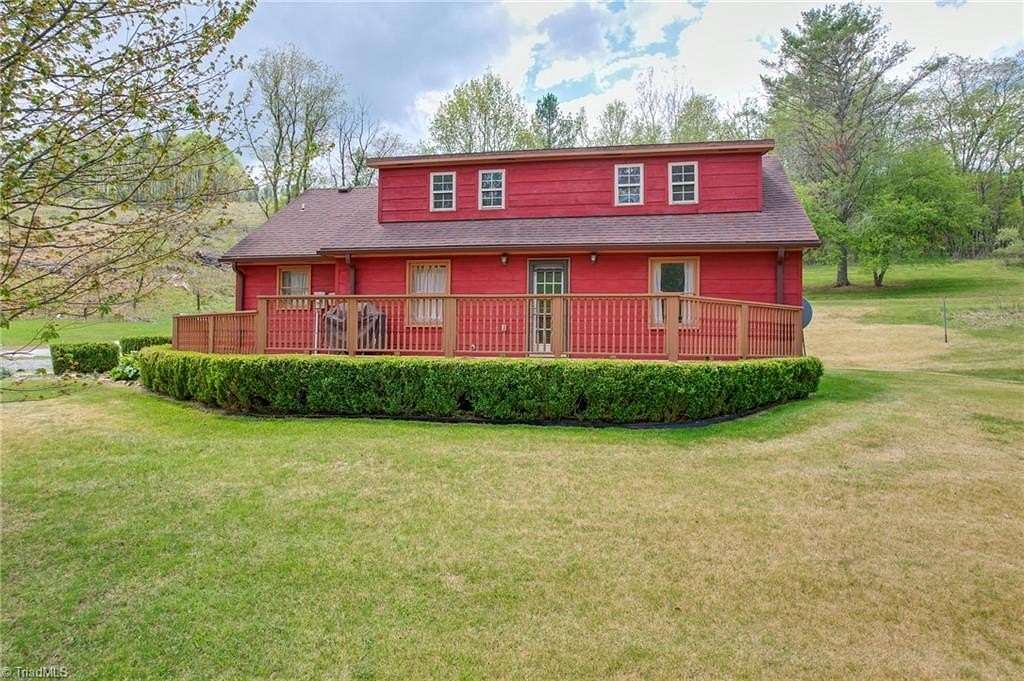 18 Acres of Land with Home for Sale in Piney Creek, North Carolina