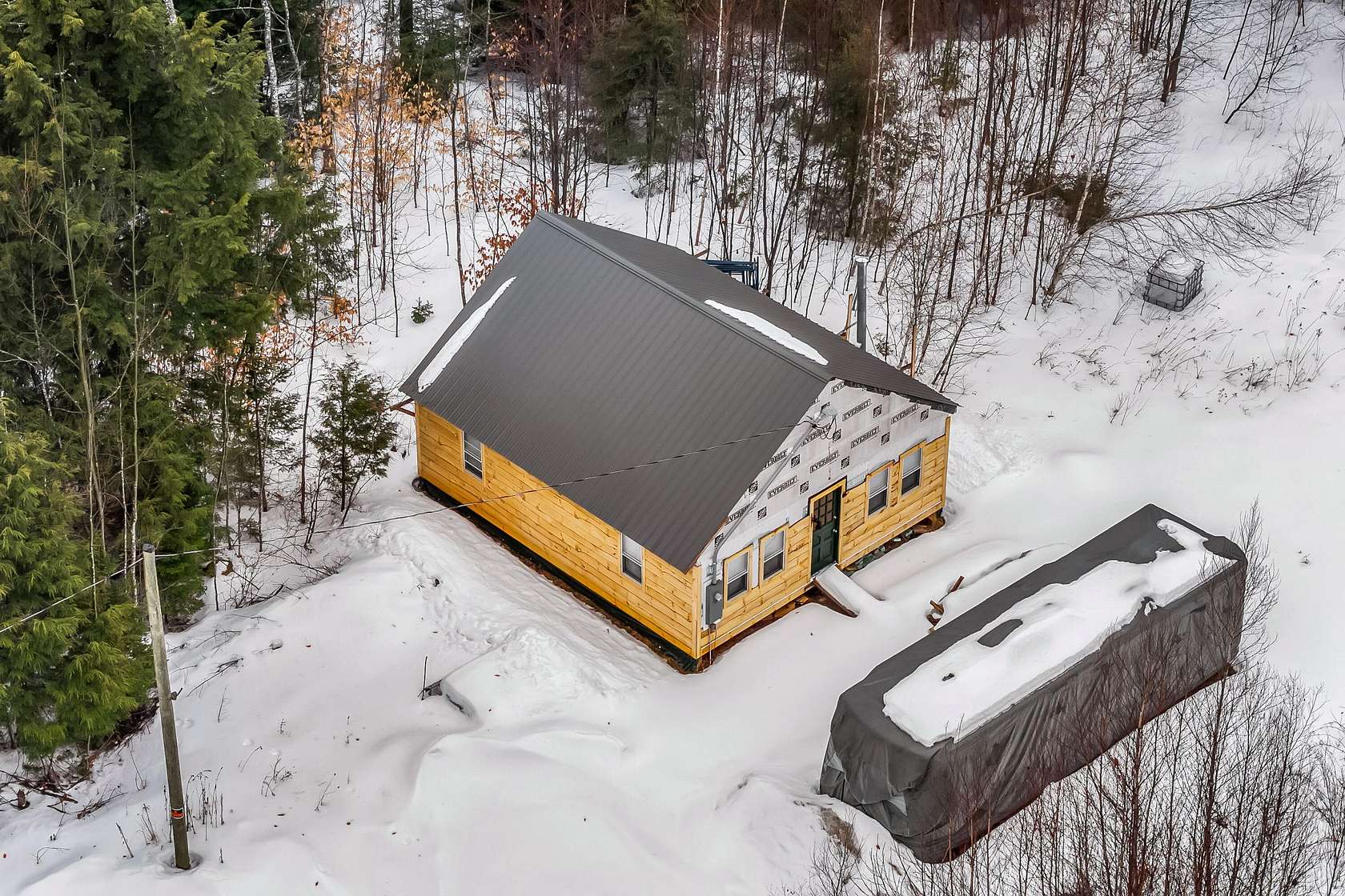 10 Acres of Recreational Land with Home for Sale in Woodville Town, Maine