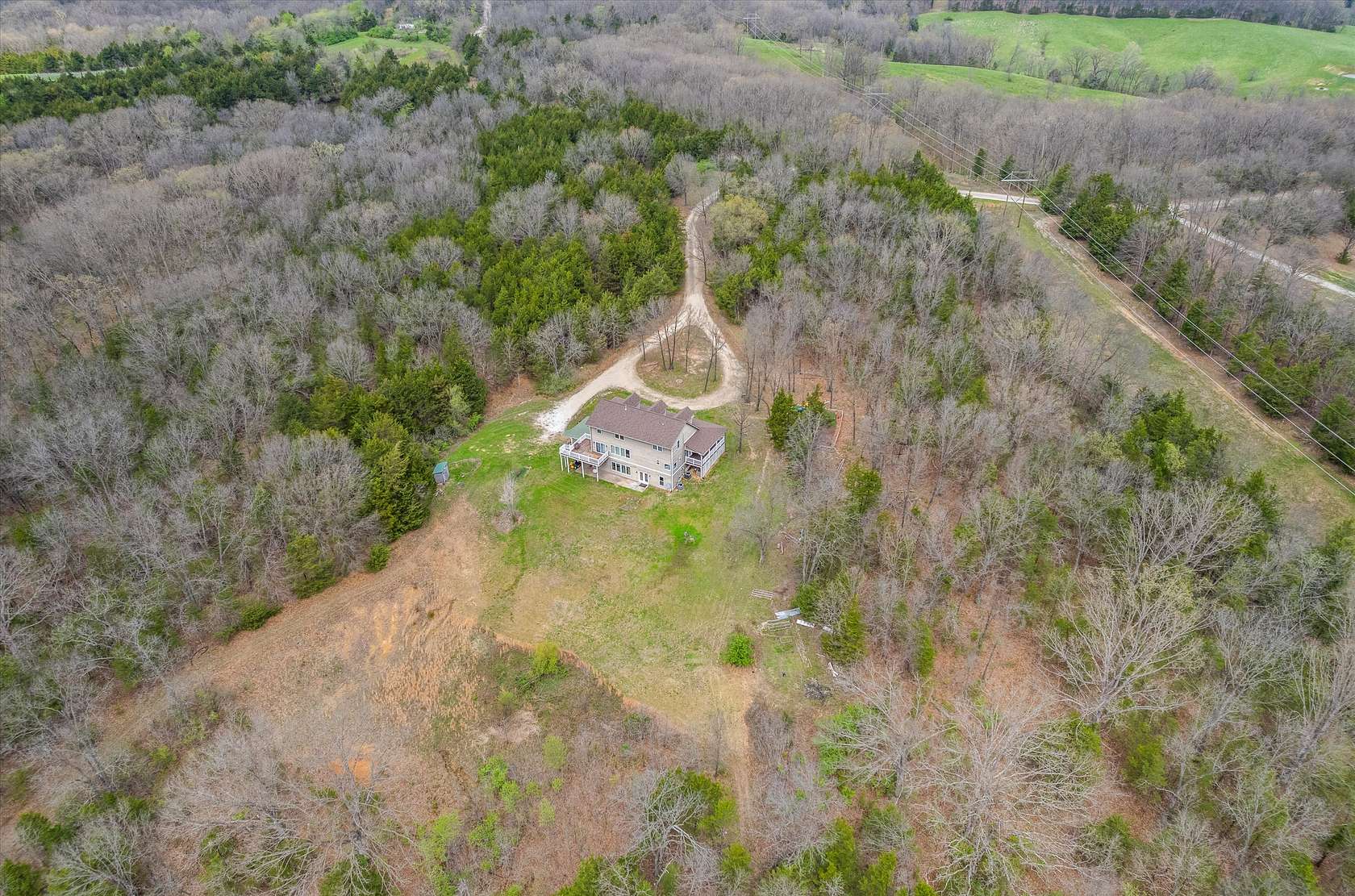 13.3 Acres of Recreational Land with Home for Sale in Harrisburg, Missouri