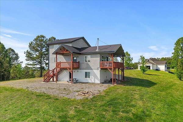 14.6 Acres of Land with Home for Sale in Etowah, Tennessee