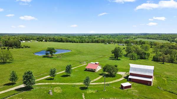 61.4 Acres of Recreational Land with Home for Sale in Fair Grove, Missouri