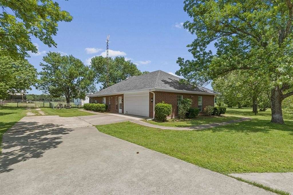 14.1 Acres of Land with Home for Sale in Denison, Texas