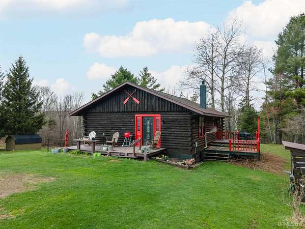 12 Acres of Land with Home for Sale in Trout Creek, Michigan