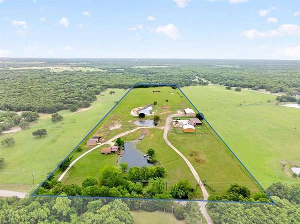 21.4 Acres of Agricultural Land with Home for Sale in Poetry, Texas