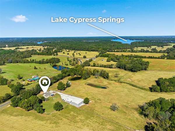 92.4 Acres of Land with Home for Sale in Scroggins, Texas