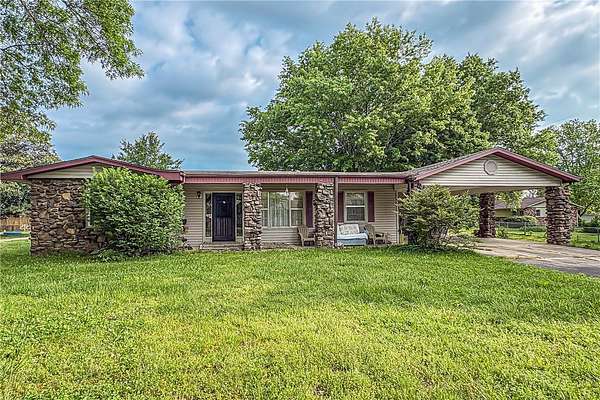 1.5 Acres of Land with Home for Sale in Harrison, Arkansas