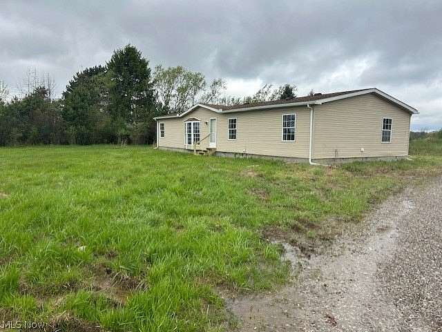 6.9 Acres of Land with Home for Sale in New London, Ohio