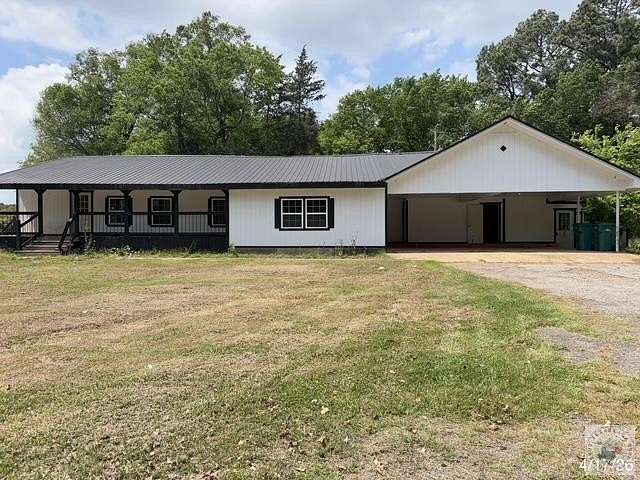 2.59 Acres of Land with Home for Sale in De Kalb, Texas