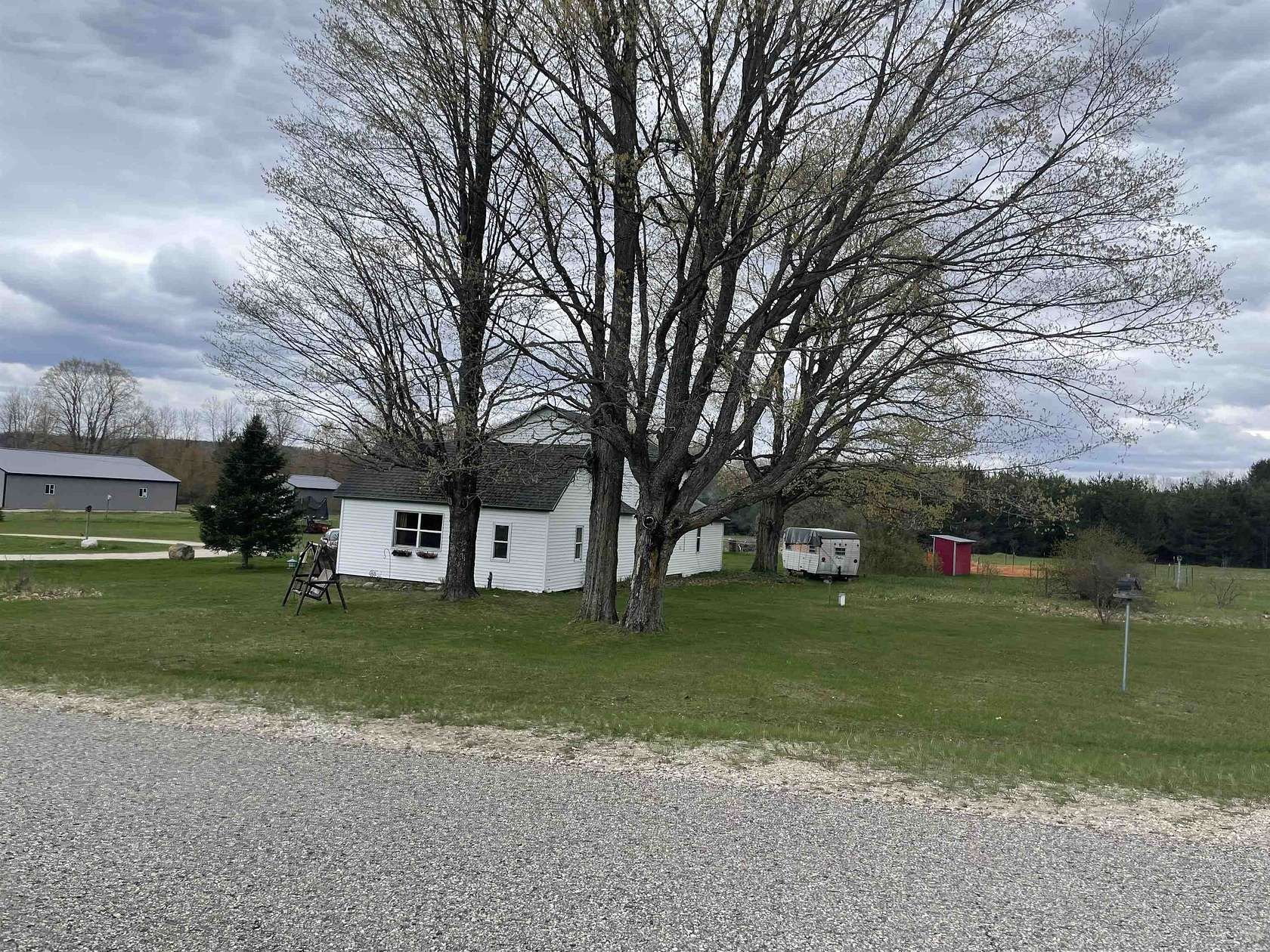 3 Acres of Land with Home for Sale in Manton, Michigan