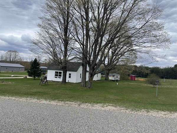 3 Acres of Land with Home for Sale in Manton, Michigan