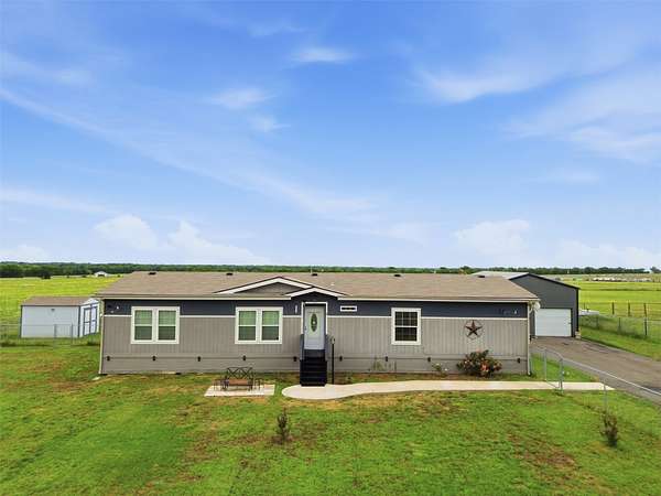 1.57 Acres of Land with Home for Sale in Leonard, Texas