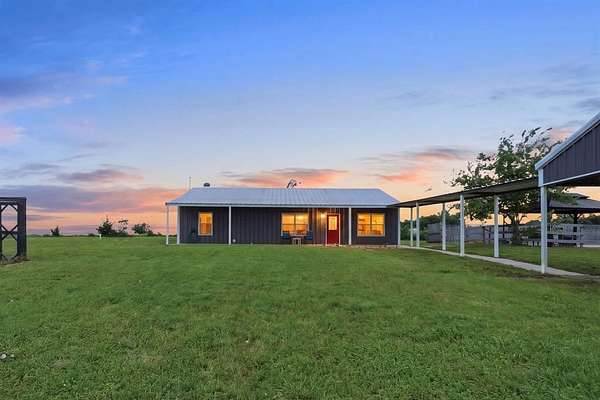 5.49 Acres of Land with Home for Sale in Wolfe City, Texas