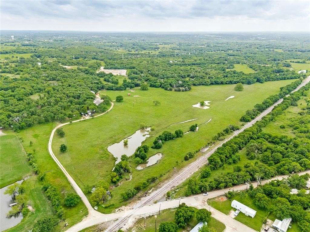 39 Acres of Agricultural Land with Home for Sale in Cleburne, Texas