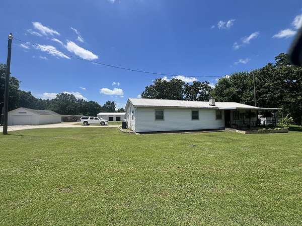 17.1 Acres of Recreational Land with Home for Sale in Buffalo, Missouri