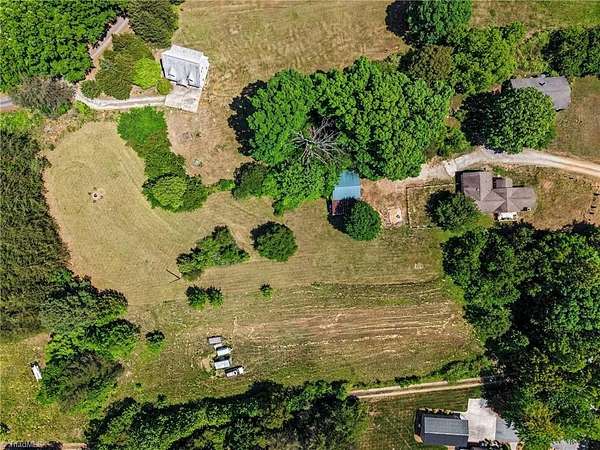 2.14 Acres of Land with Home for Sale in Oak Ridge, North Carolina