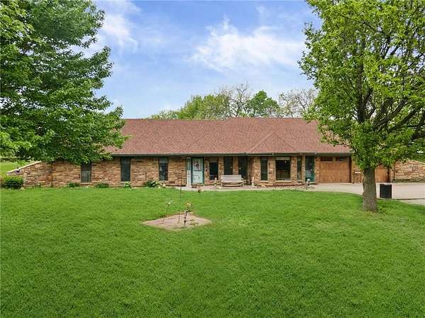 12.3 Acres of Land with Home for Sale in Oak Grove, Missouri