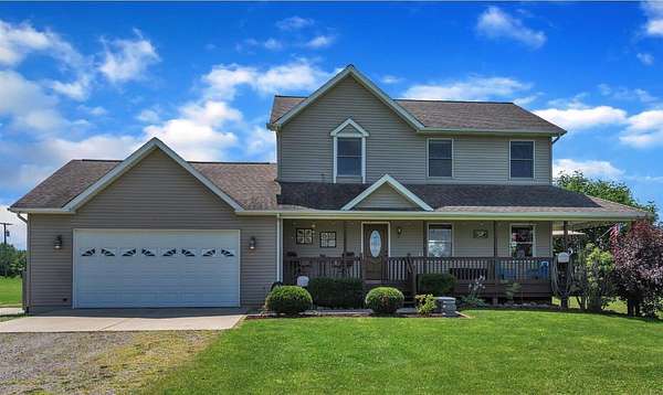5.1 Acres of Land with Home for Sale in Perry, Michigan