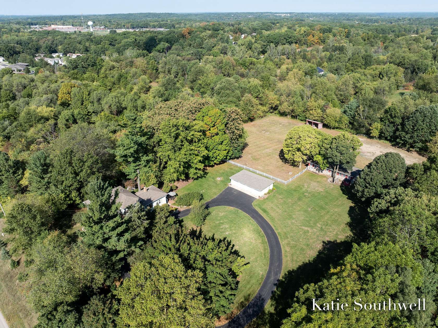 6.25 Acres of Land with Home for Sale in Rockford, Michigan