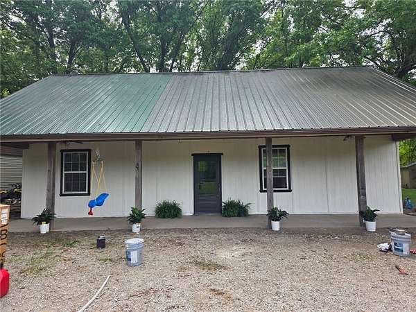 19.1 Acres of Land with Home for Sale in Hume, Missouri