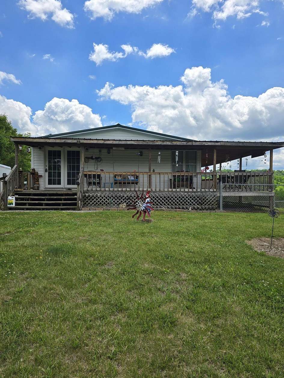 2.16 Acres of Land with Home for Sale in Bybee, Tennessee