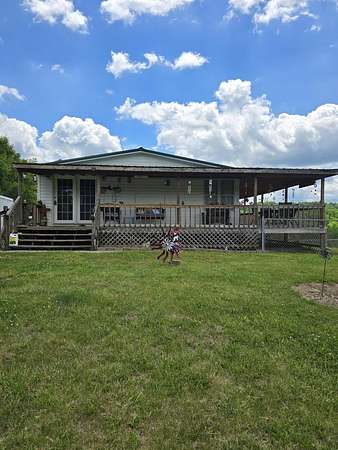 2.16 Acres of Land with Home for Sale in Bybee, Tennessee