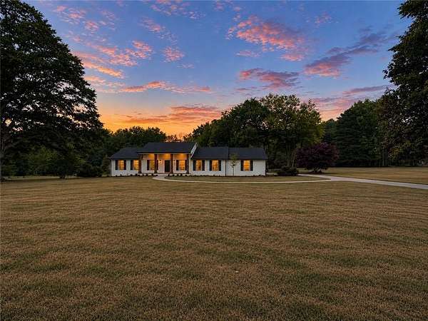 5.12 Acres of Land with Home for Sale in Cumming, Georgia