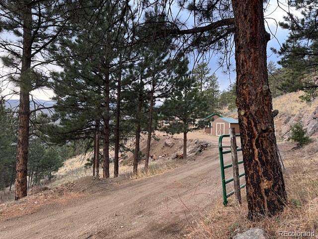 40 Acres of Recreational Land with Home for Sale in Bellvue, Colorado
