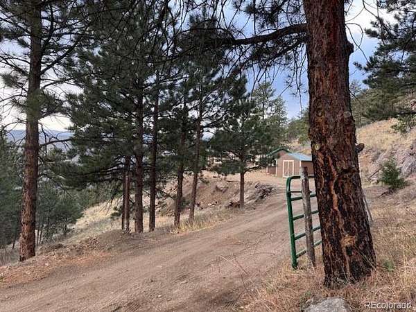 40 Acres of Recreational Land with Home for Sale in Bellvue, Colorado