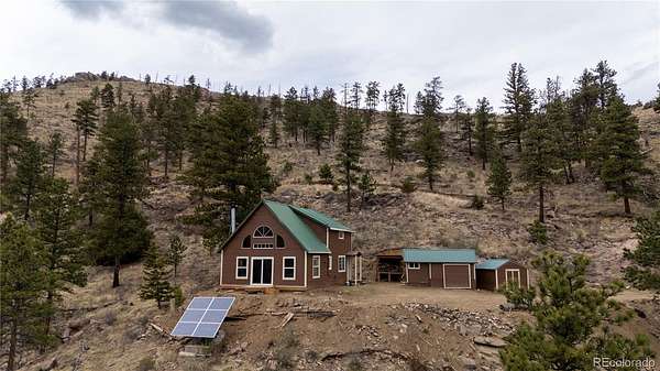40 Acres of Recreational Land with Home for Sale in Bellvue, Colorado