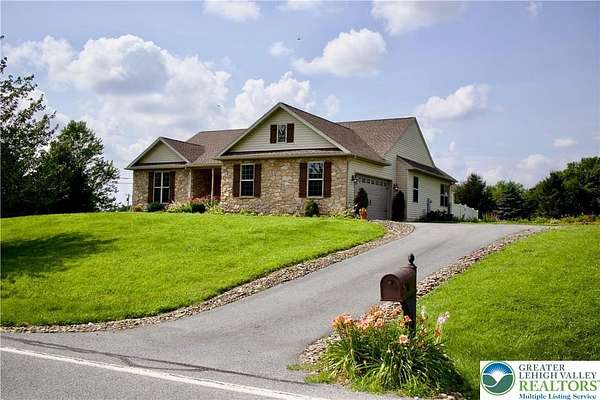 2 Acres of Land with Home for Sale in Longswamp Township, Pennsylvania