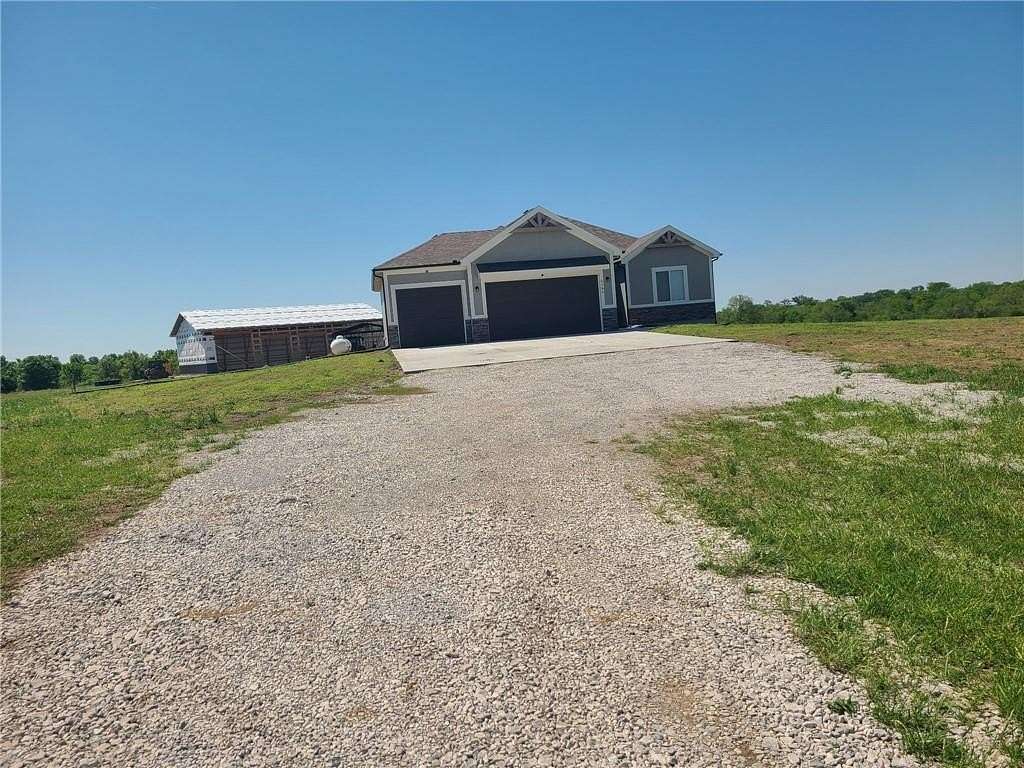 22 Acres of Land with Home for Sale in Peculiar, Missouri